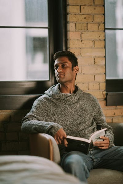 Man holding camera facing forward