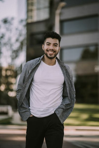 Man holding camera facing forward
