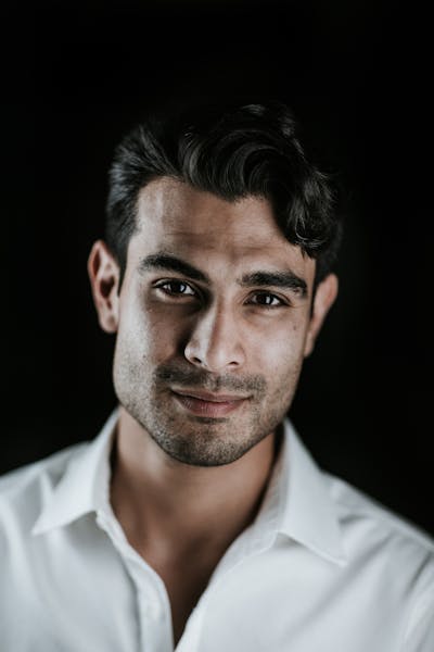 Man holding camera facing forward