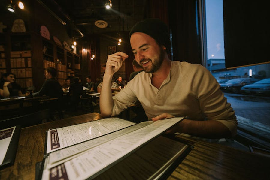 Man holding camera facing forward