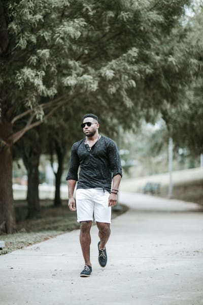 Man holding camera facing forward